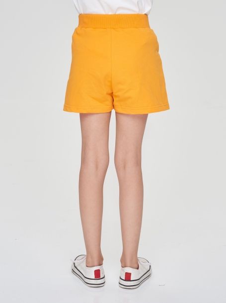 Фото4: Трикотажные оранжевые шорты