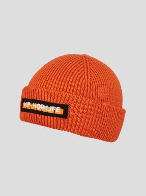 Фото1: Оранжевая трикотажная вязаная шапка