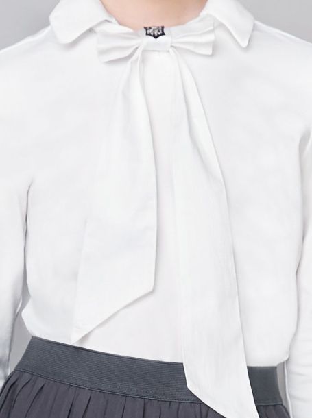 Фото3: Трикотажная белая блузка